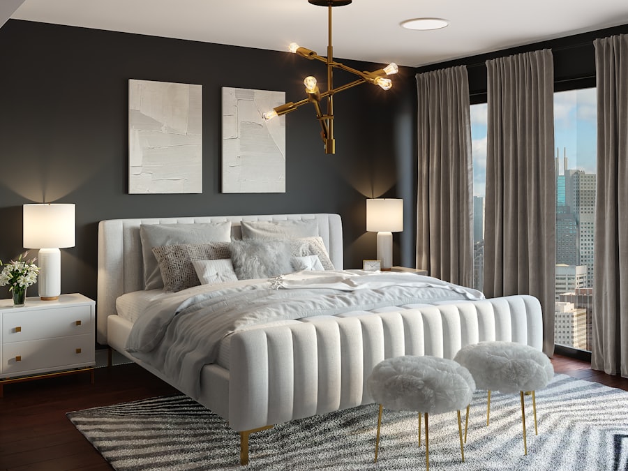 Styled primary bedroom with a feature chandelier and city view through floor-to-ceiling windows